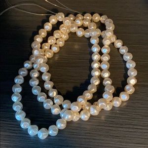 String of Double Strand  Pearl looking Beads...
